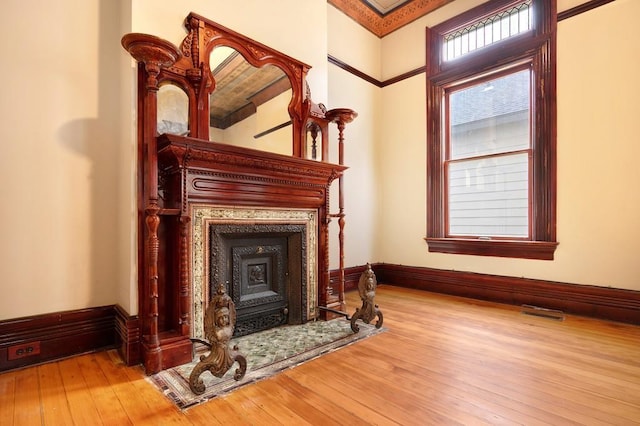 sitting room with wood-type flooring