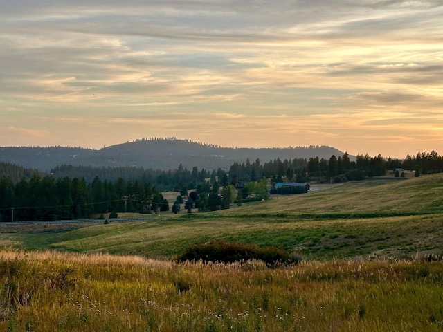 view of mountain feature featuring a rural view