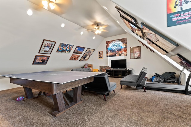 playroom with ceiling fan, carpet, and vaulted ceiling