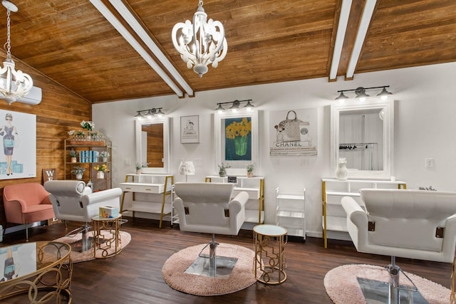 living area with lofted ceiling with beams, a notable chandelier, wooden walls, and wooden ceiling