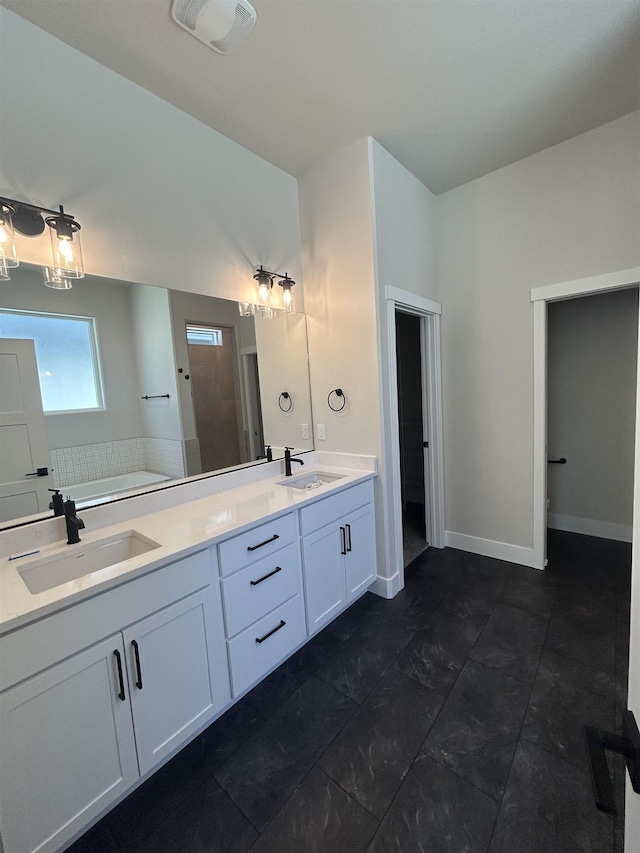 6010 N Windsor St, Spokane, WA 99208 - full bath featuring a sink, a garden tub, double vanity, and visible vents