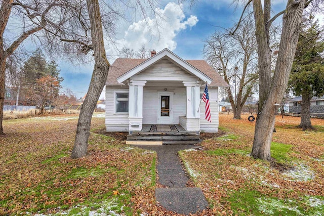 bungalow-style home with a porch