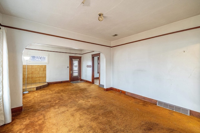 empty room featuring carpet floors