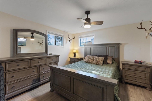 bedroom featuring ceiling fan and light wood-type flooring