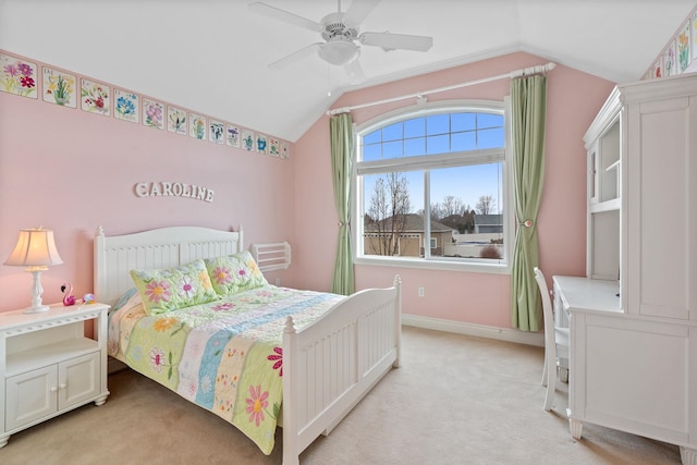 carpeted bedroom featuring vaulted ceiling and ceiling fan