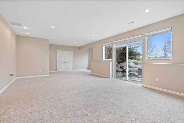 view of carpeted spare room