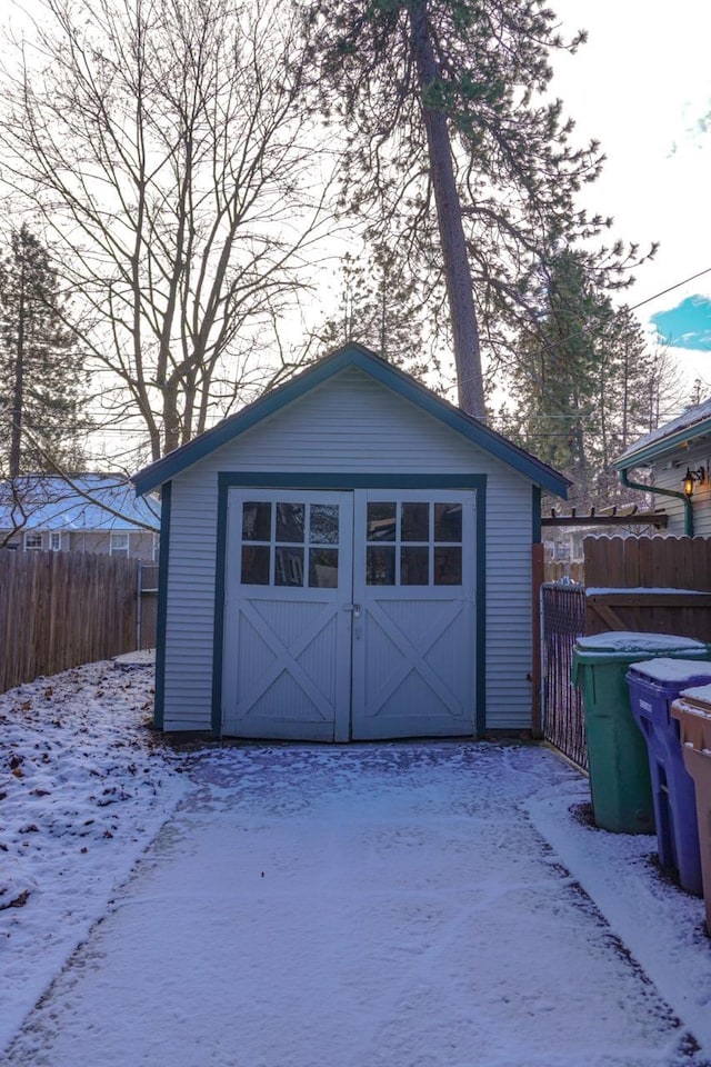 view of snow covered garage