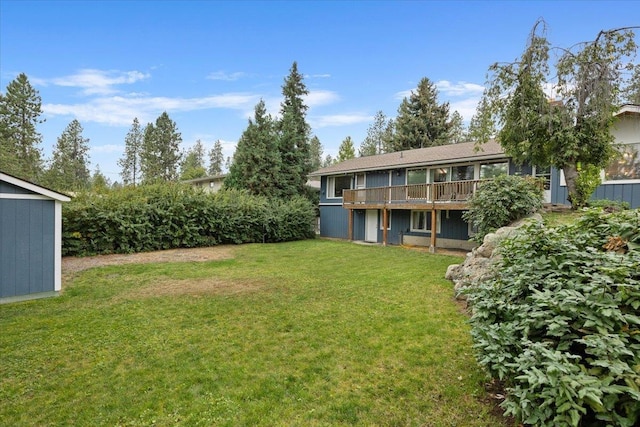 view of yard with a deck