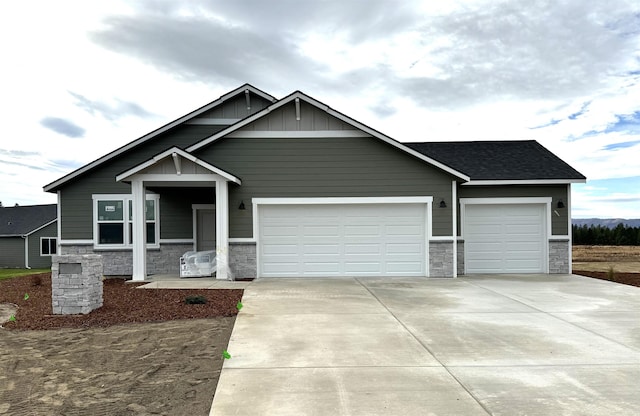 craftsman-style home featuring a garage