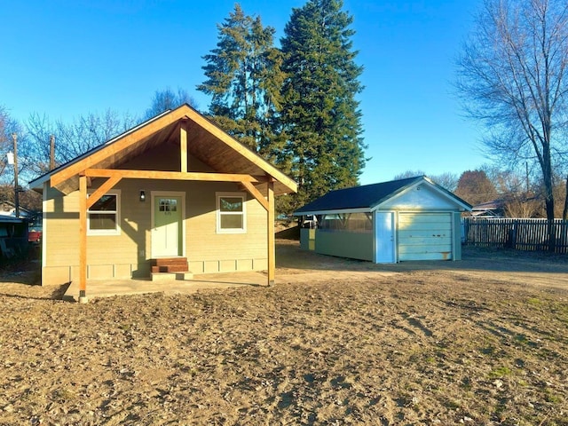 view of front of property with an outbuilding and a garage