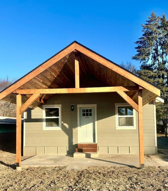 back of property with a patio area