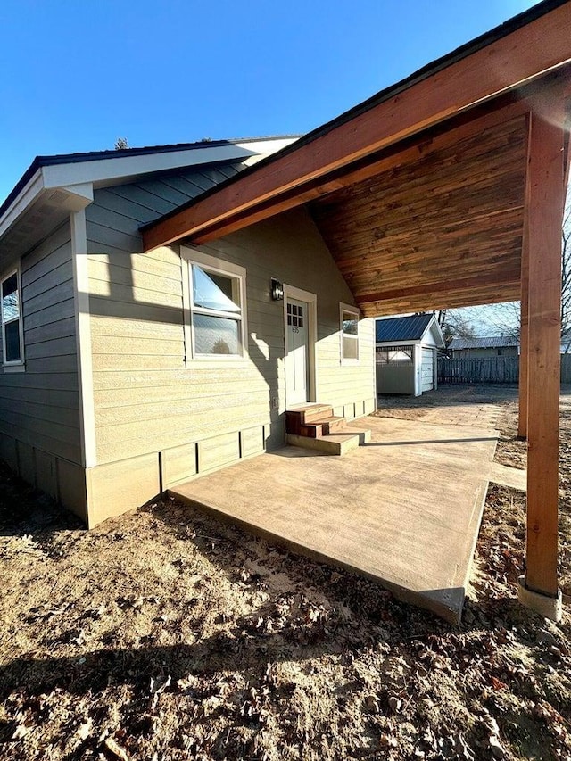 exterior space with a storage shed