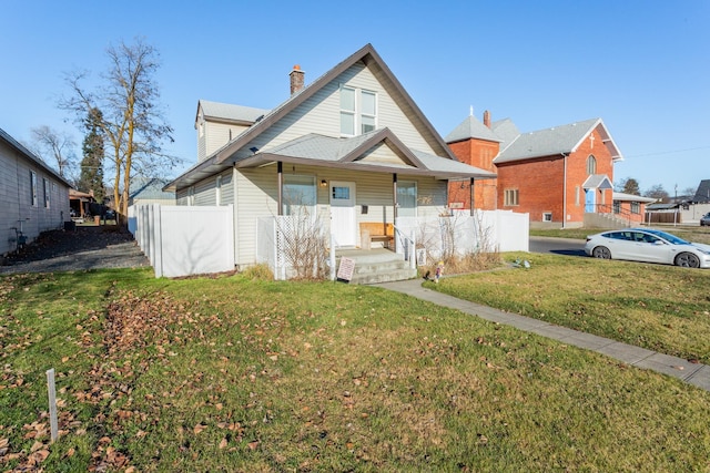 view of front of home with a front lawn