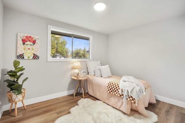 bedroom featuring hardwood / wood-style flooring