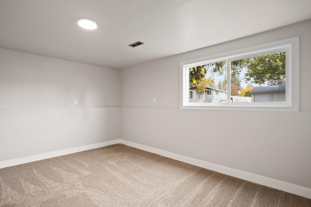 view of carpeted spare room