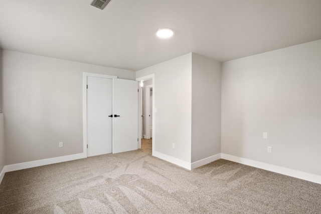 view of carpeted spare room