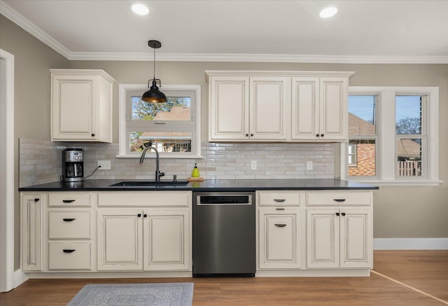 kitchen featuring crown molding, tasteful backsplash, stainless steel dishwasher, sink, and light hardwood / wood-style flooring