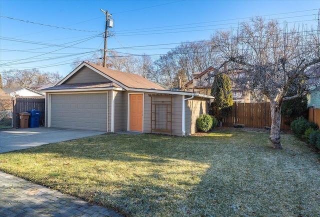 garage with a lawn