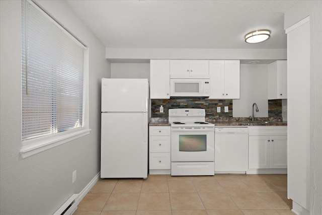 kitchen with sink, white cabinets, light tile patterned floors, white appliances, and decorative backsplash