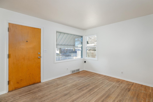 foyer featuring light wood-type flooring