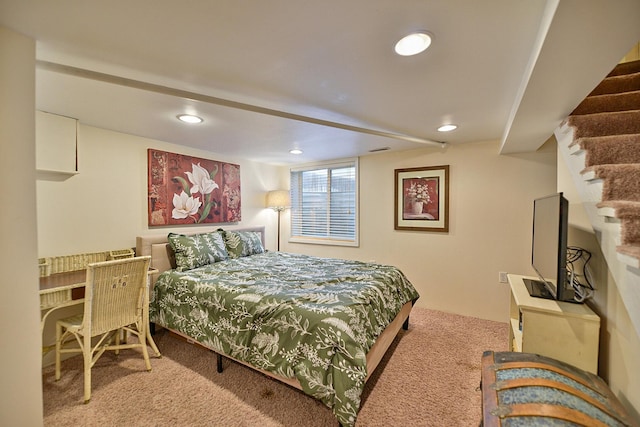 bedroom with light colored carpet