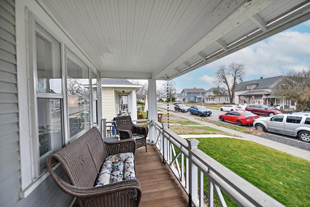 balcony featuring covered porch