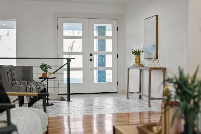 doorway to outside featuring a wealth of natural light and french doors