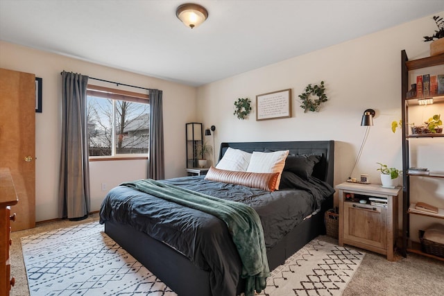 bedroom with light carpet