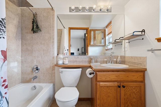 full bathroom featuring toilet, vanity, and shower / bathtub combination with curtain