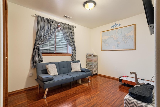 living area featuring hardwood / wood-style flooring