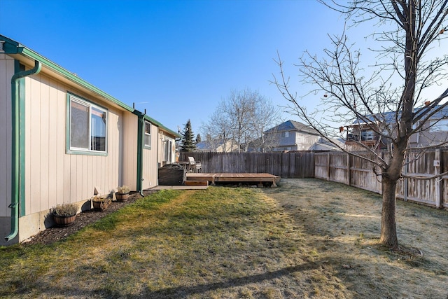 view of yard with a deck