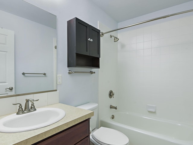 full bathroom featuring toilet, shower / bathing tub combination, and vanity