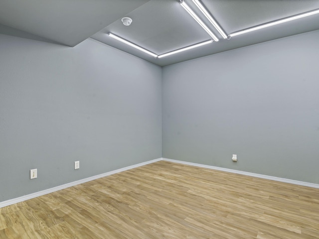 empty room with light hardwood / wood-style floors