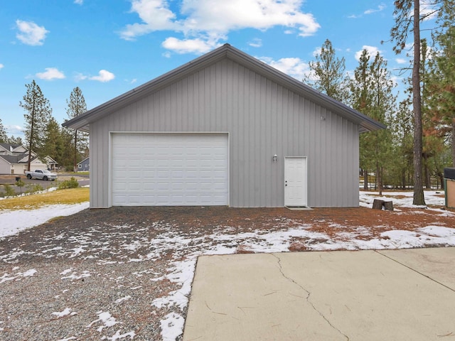 view of snow covered garage