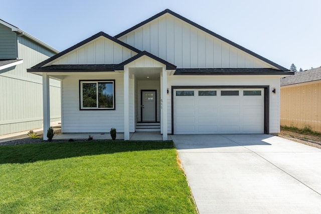 view of front facade with a garage and a front yard