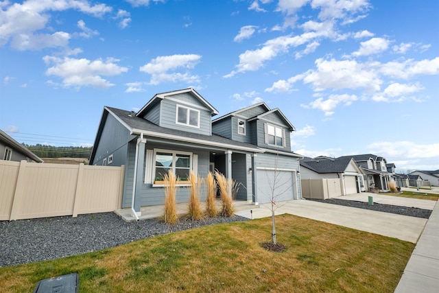 view of front of home with a garage, a porch, and a front yard