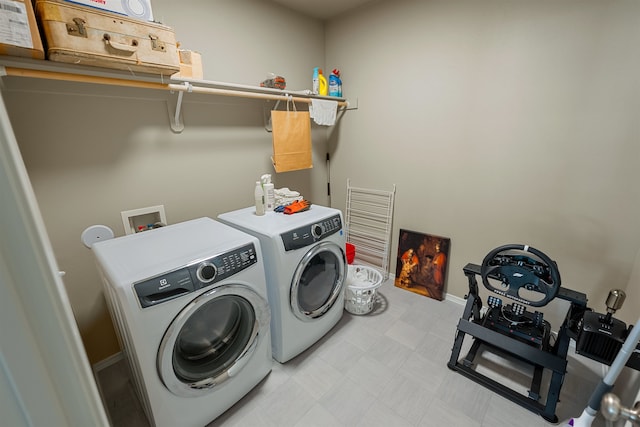 laundry room featuring independent washer and dryer