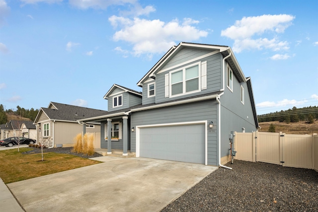 view of front of home featuring a garage and a front lawn