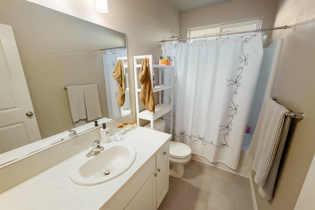 full bathroom with shower / tub combo, vanity, and toilet