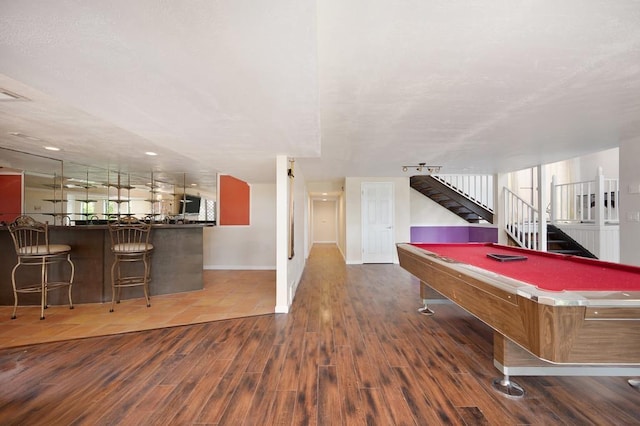 rec room with dark hardwood / wood-style floors and billiards