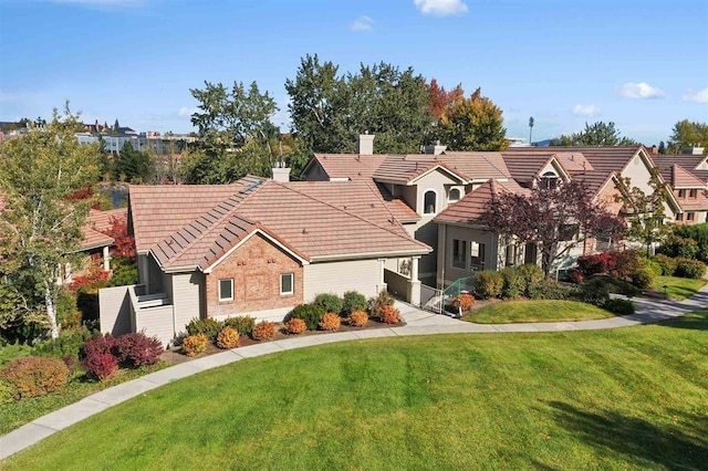 view of front of home featuring a front yard