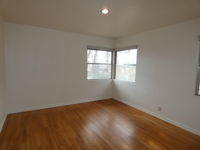 empty room featuring wood-type flooring