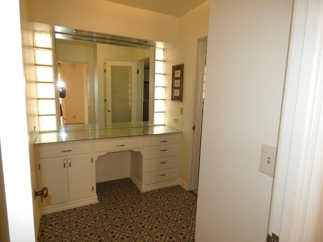 bathroom featuring tile patterned flooring