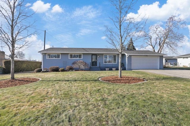 ranch-style house with a garage and a front yard