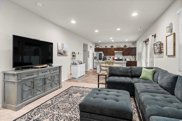 dining room with recessed lighting, light wood-style flooring, and visible vents