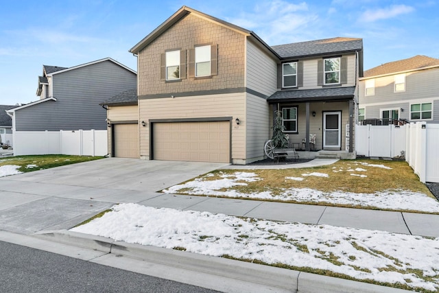 front of property with a porch and a garage