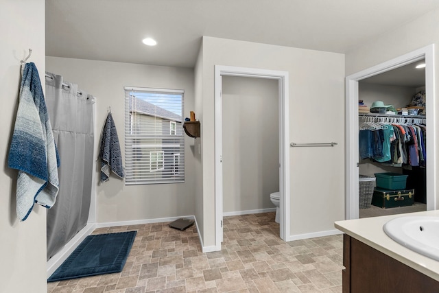 carpeted bedroom with baseboards and visible vents