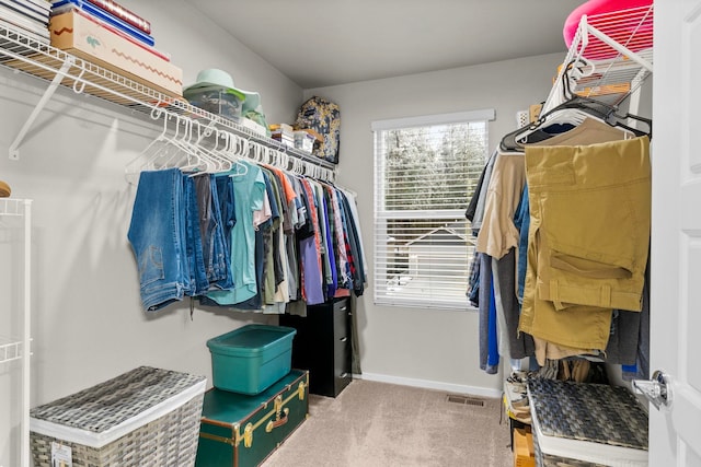 carpeted home office featuring baseboards