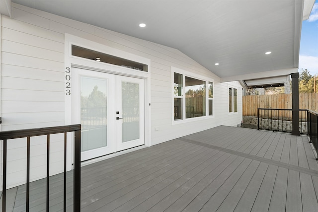 wooden deck featuring french doors