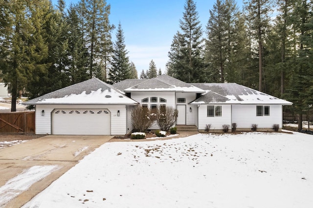 single story home featuring a garage